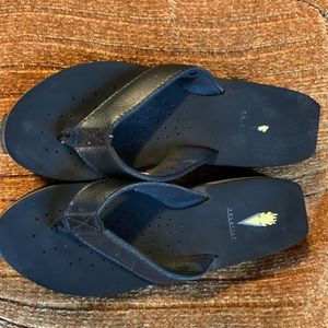 Volatile wedge flip flop sandals